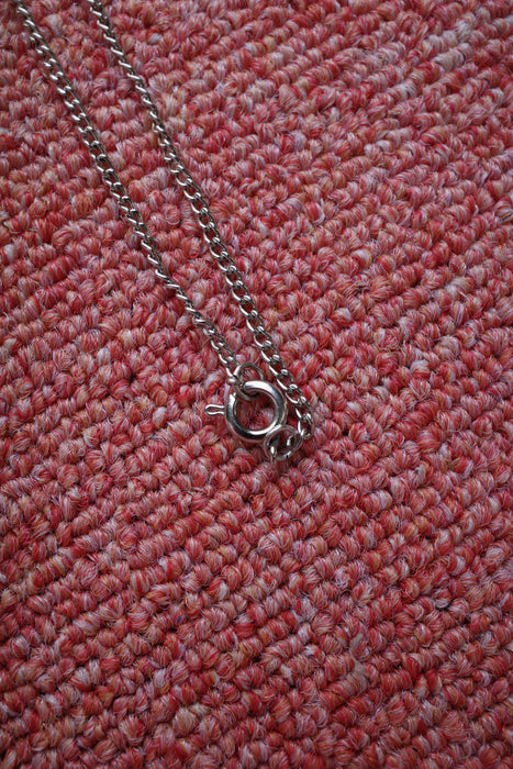 70s silver middle finger necklace