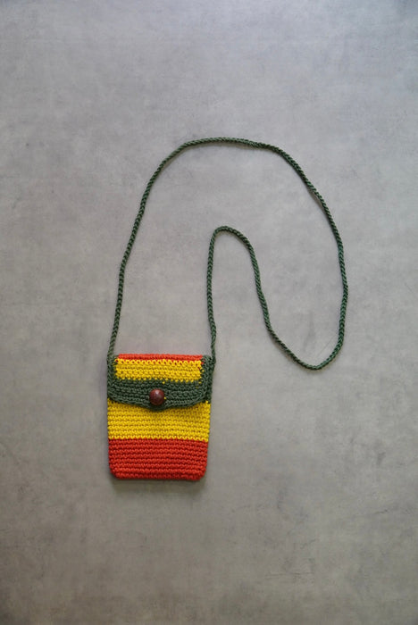 hand knitted rasta pouch