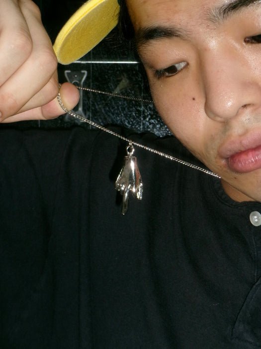 70s silver middle finger necklace