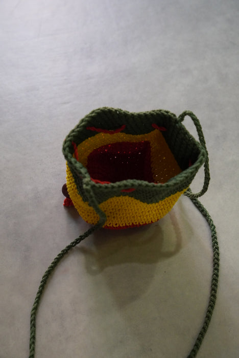 hand knitted rasta pouch