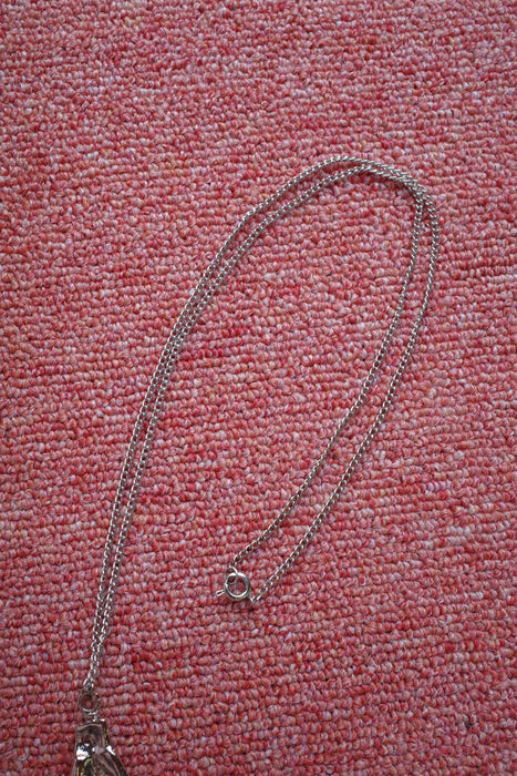 70s silver middle finger necklace