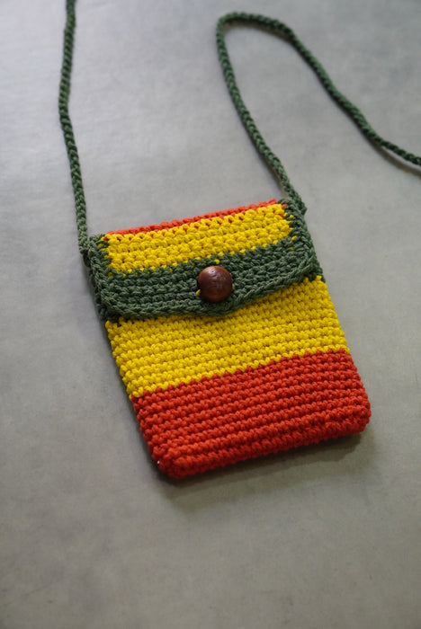 hand knitted rasta pouch