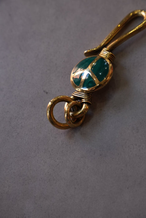 handmade brass key chain "peace" green