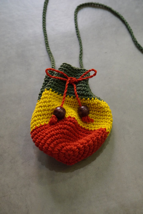 hand knitted rasta pouch