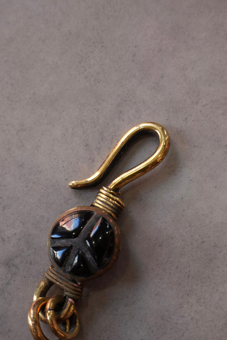 handmade brass key chain "peace" black
