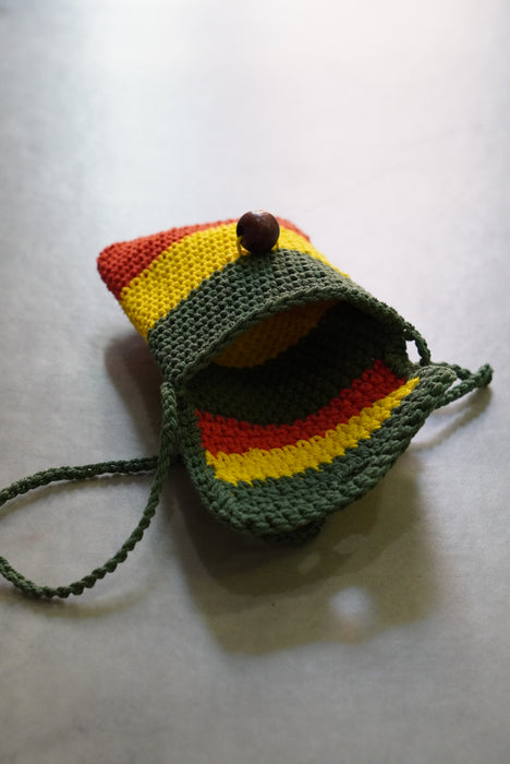 hand knitted rasta pouch