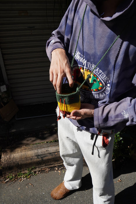 hand knitted rasta pouch