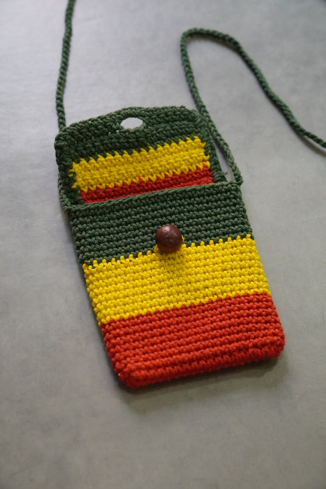 hand knitted rasta pouch