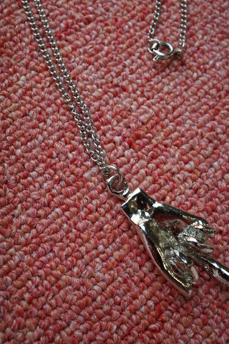 70s silver middle finger necklace